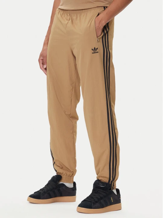 Zdjęcie produktu adidas Spodnie dresowe adicolor Woven Firebird JY1339 Beżowy Regular Fit