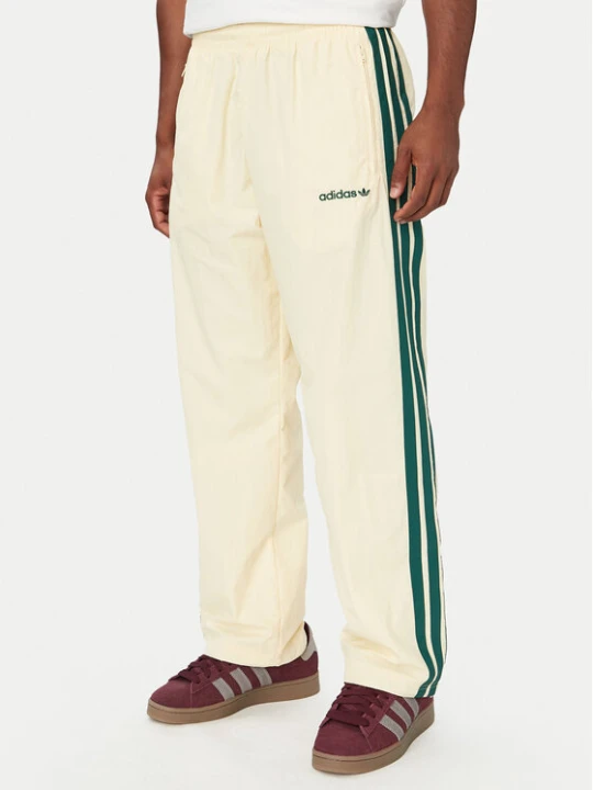 Zdjęcie produktu adidas Spodnie dresowe Cutline Track Tracksuit Bottoms KW8021 Kremowy Regular Fit