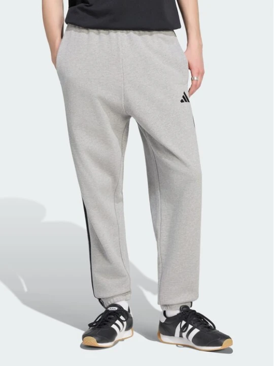 Zdjęcie produktu adidas Spodnie dresowe Essentials 3-Stripes KY4195 Szary jasny Regular Fit