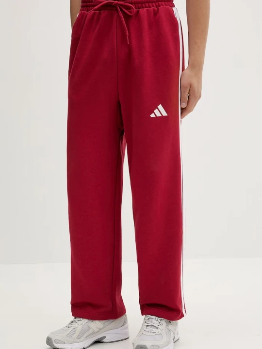 Zdjęcie produktu adidas spodnie dresowe Essentials czerwony