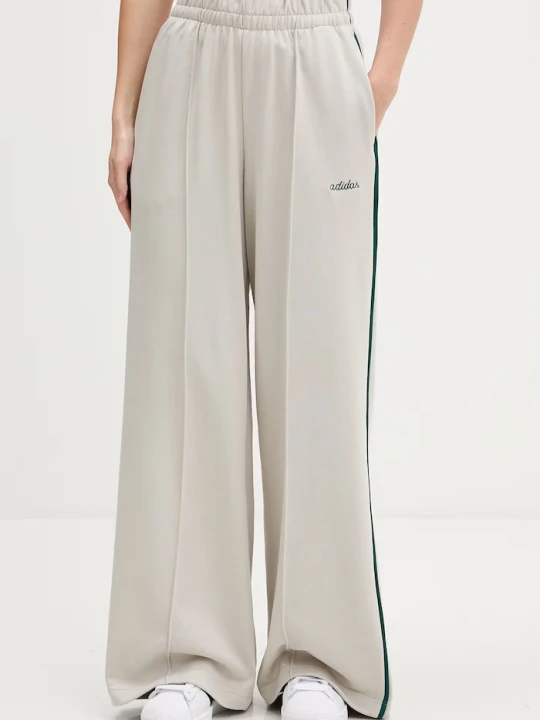 Zdjęcie produktu adidas spodnie dresowe Essentials Colourpop beżowy