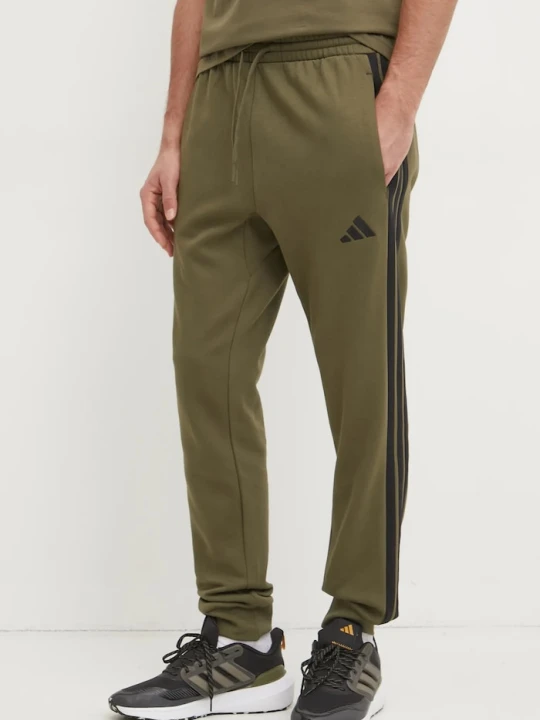 Zdjęcie produktu adidas spodnie dresowe Essentials zielony