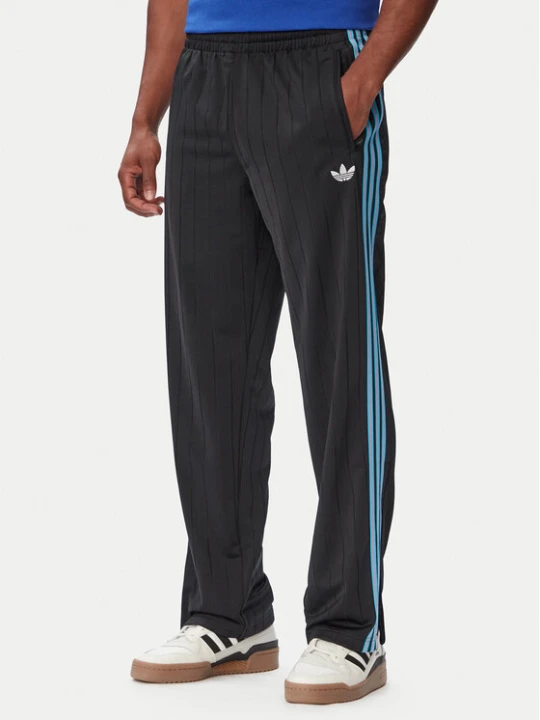 Zdjęcie produktu adidas Spodnie dresowe Firebird Drop Needle KE4136 Czarny Regular Fit