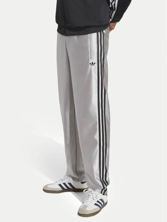 Zdjęcie produktu adidas Spodnie dresowe Firebird IA2222 Szary jasny Regular Fit
