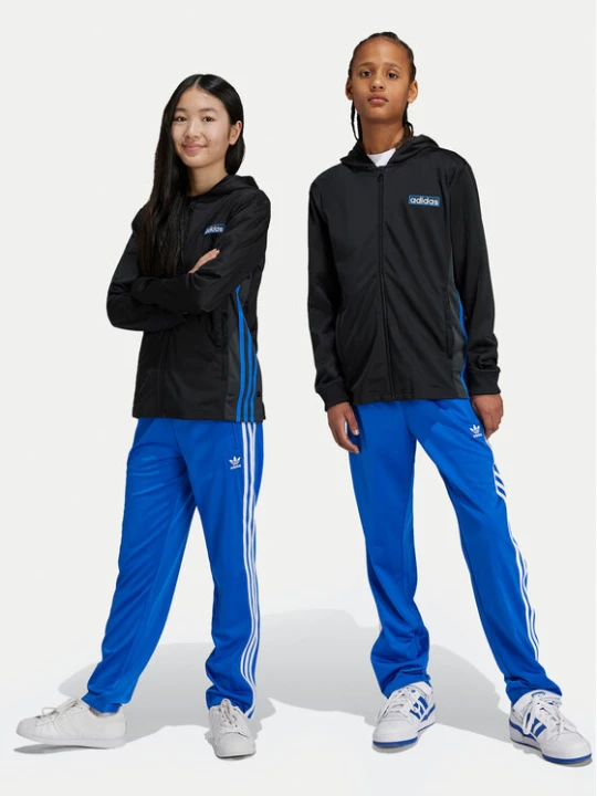 Zdjęcie produktu adidas Spodnie dresowe Firebird IY9803 Niebieski Regular Fit