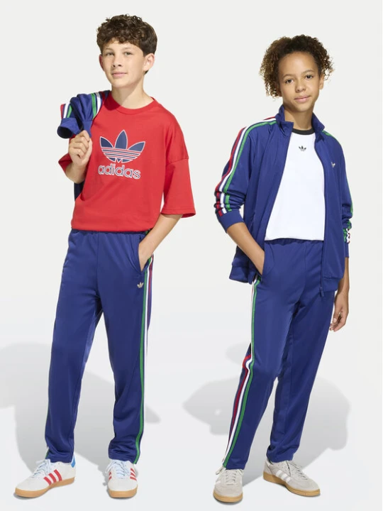 Zdjęcie produktu adidas Spodnie dresowe Firebird KC9503 Niebieski Regular Fit