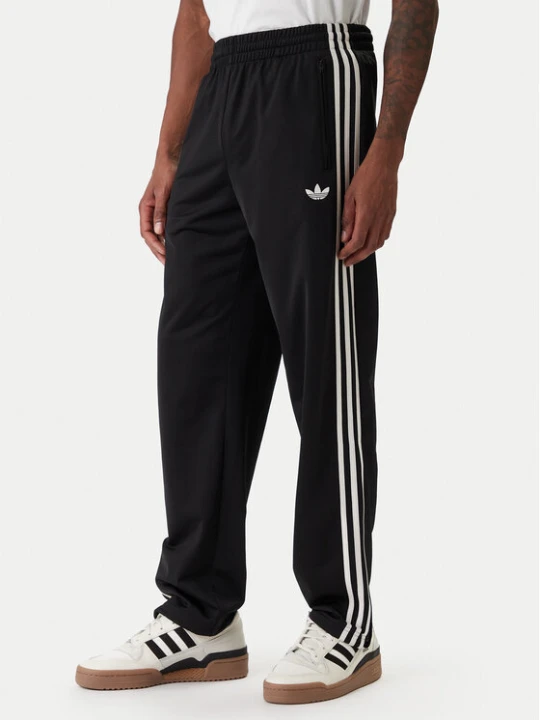 Zdjęcie produktu adidas Spodnie dresowe Firebird KD8315 Czarny Loose Fit