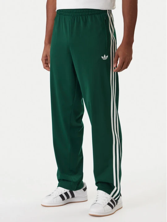 Zdjęcie produktu adidas Spodnie dresowe Firebird KD8317 Zielony Loose Fit