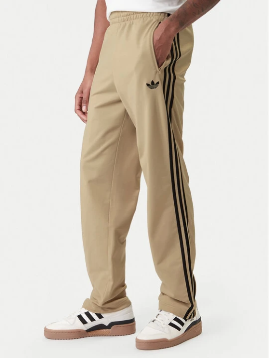 Zdjęcie produktu adidas Spodnie dresowe Firebird KE6679 Beżowy Loose Fit