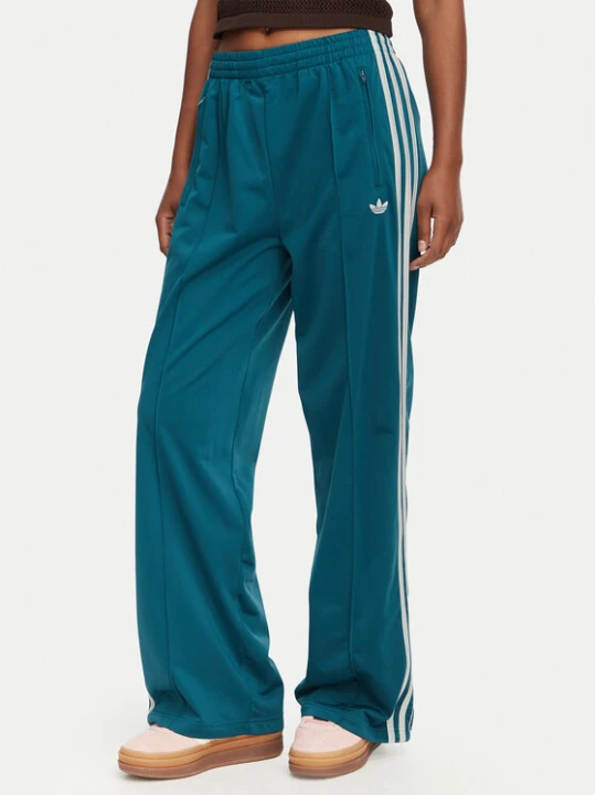 Zdjęcie produktu adidas Spodnie dresowe Firebird Loose Tracksuit KS4672 Turkusowy Loose Fit