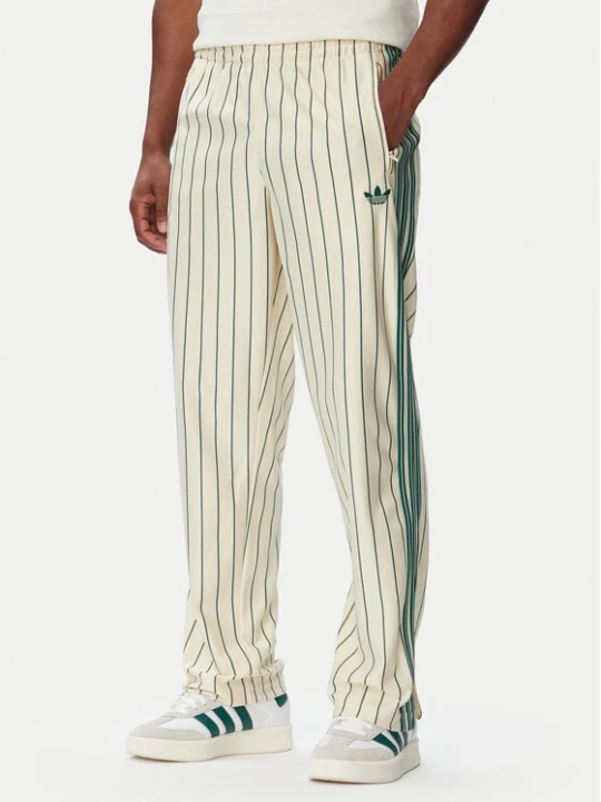 Zdjęcie produktu adidas Spodnie dresowe Firebird Pinstripes KT4300 Kremowy Regular Fit