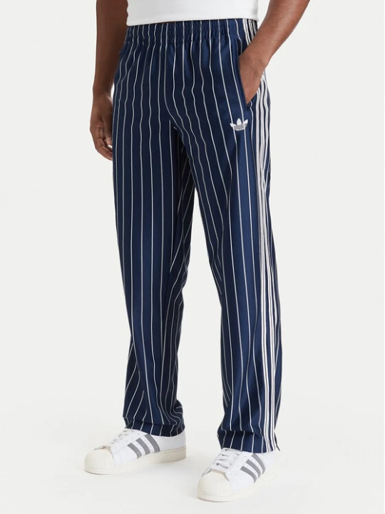 Zdjęcie produktu adidas Spodnie dresowe Firebird Pinstripes Track Pants KR7231 Granatowy Regular Fit