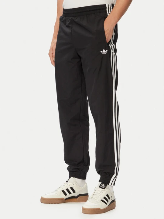 Zdjęcie produktu adidas Spodnie dresowe Firebird Woven KE1371 Czarny Regular Fit