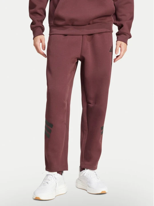 Zdjęcie produktu adidas Spodnie dresowe Future Icons 3-Stripes JD4888 Bordowy Loose Fit