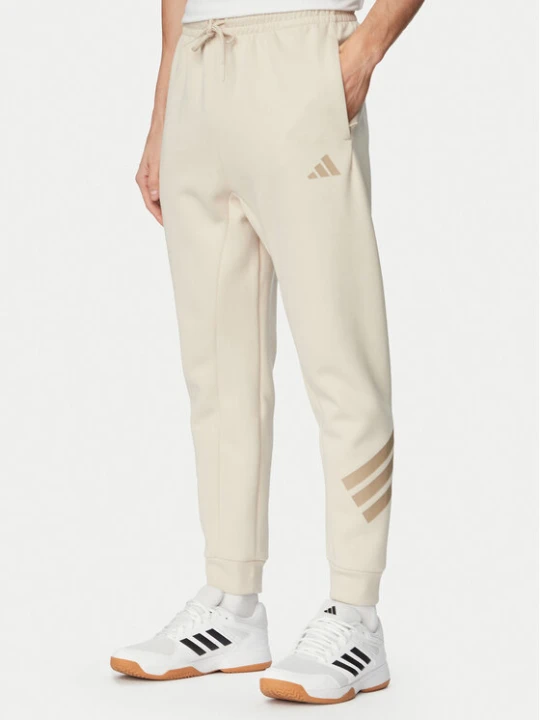 Zdjęcie produktu adidas Spodnie dresowe Future Icons 3-Stripes KD5206 Beżowy Regular Fit