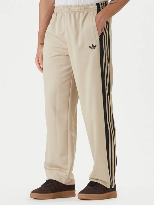 Zdjęcie produktu adidas Spodnie dresowe KE0116 Beżowy Loose Fit