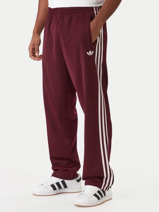 Zdjęcie produktu adidas Spodnie dresowe KE1651 Bordowy Regular Fit
