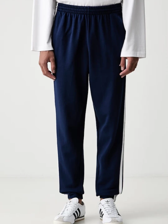 Zdjęcie produktu adidas spodnie dresowe męskie bawełniane Essentials granatowy