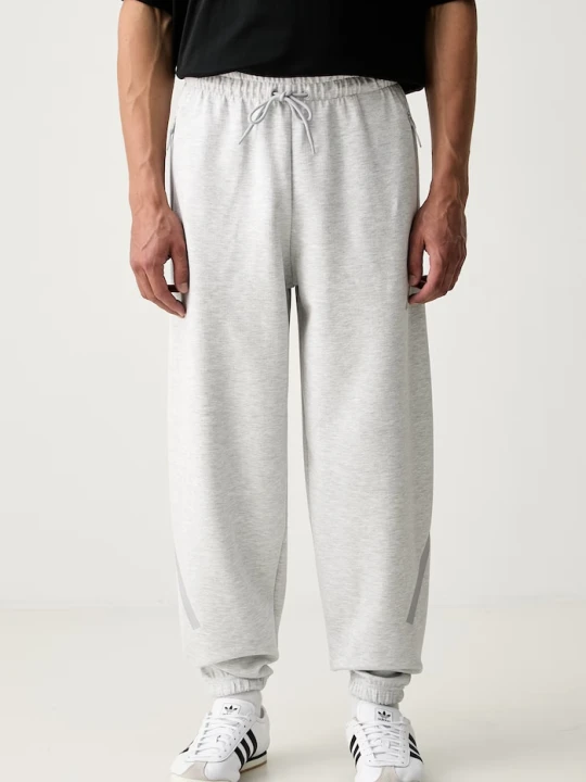 Zdjęcie produktu adidas spodnie dresowe męskie z bawełną Z.N.E. szary