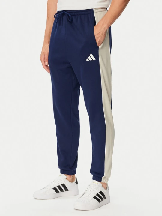 Zdjęcie produktu adidas Spodnie dresowe Seasonal Essentials Colorblock Fleece KF4211 Niebieski Cosy Fleece Fit