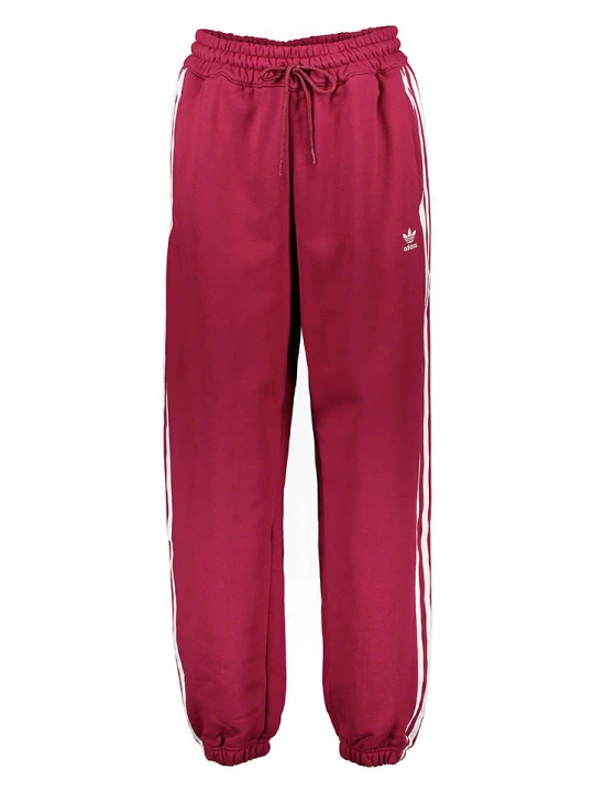 Zdjęcie produktu adidas Spodnie dresowe w kolorze czerwonym rozmiar: 34