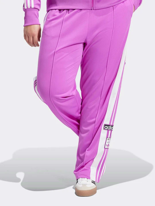 Zdjęcie produktu adidas Spodnie dresowe w kolorze różowo-białym rozmiar: 2X