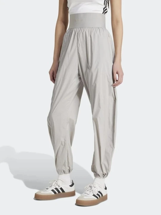 Zdjęcie produktu adidas Spodnie dresowe w kolorze szarym rozmiar: XS