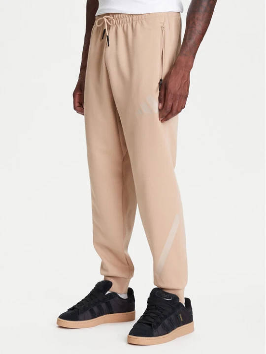 Zdjęcie produktu adidas Spodnie dresowe Z.N.E. JW4725 Beżowy Loose Fit