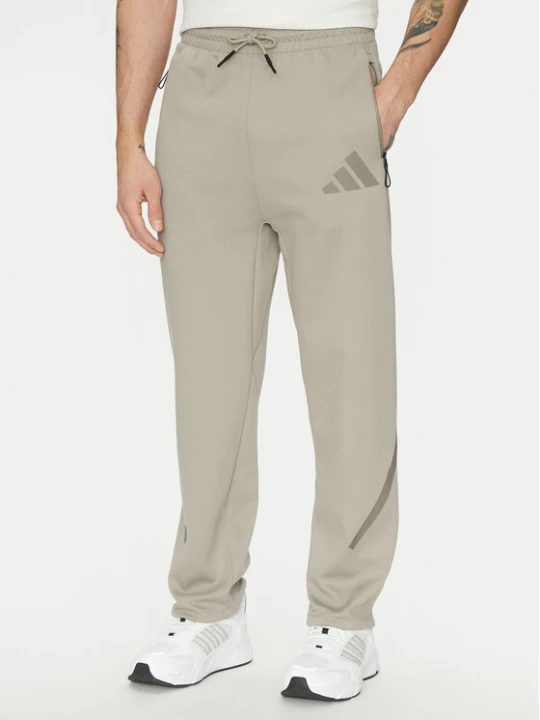 Zdjęcie produktu adidas Spodnie dresowe Z.N.E. Open-Hem JC6716 Beżowy Loose Fit