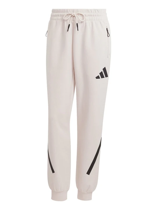 Zdjęcie produktu adidas Spodnie dresowe "Z.N.E." w kolorze kremowym rozmiar: S