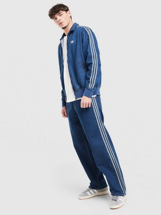 Zdjęcie produktu adidas Spodnie Firebird Denim niebieski