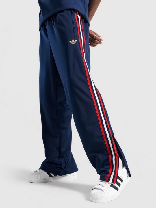 Zdjęcie produktu adidas Spodnie Firebird Tp granatowy