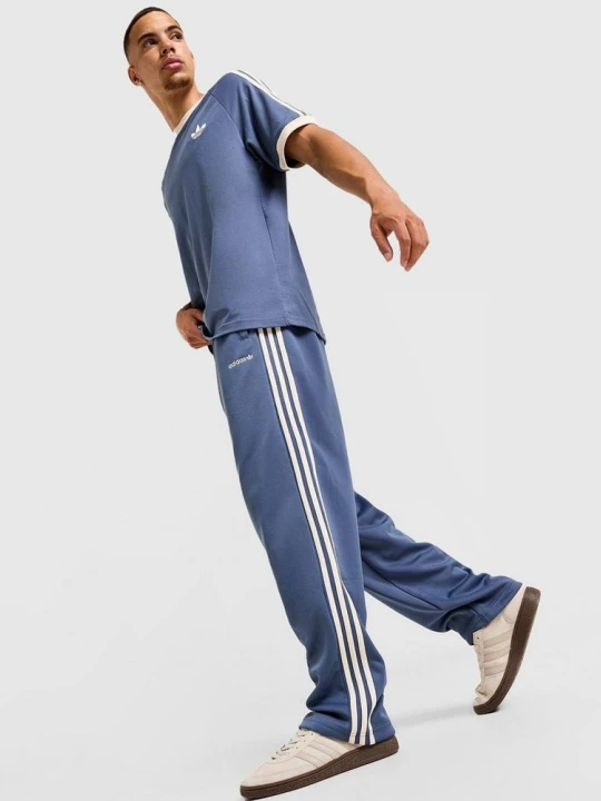 Zdjęcie produktu adidas Spodnie First niebieski