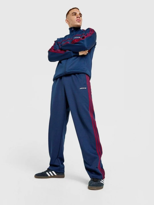 Zdjęcie produktu adidas Spodnie First Tp granatowy