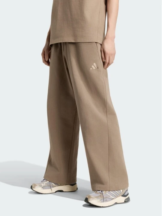 Zdjęcie produktu adidas Spodnie dresowe Kit Small Logo Wide KW2339 Beżowy Relaxed Fit