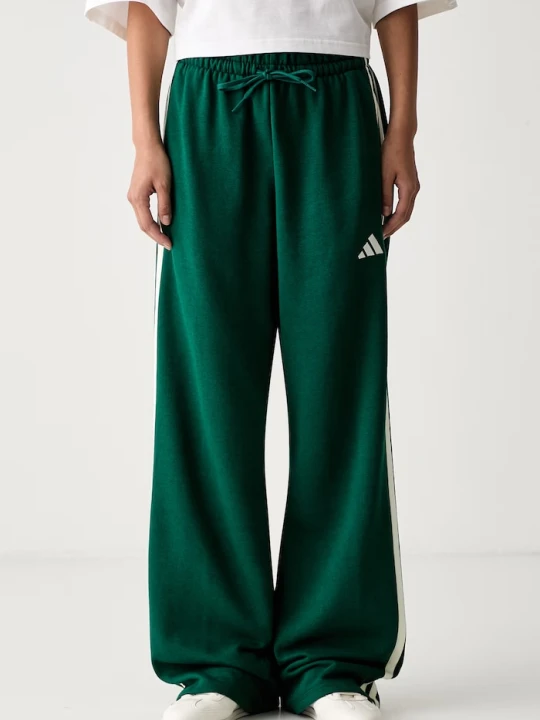 Zdjęcie produktu adidas spodnie straight damskie z bawełną Essentials zielony