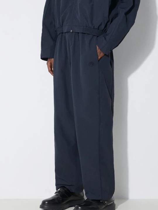 Zdjęcie produktu AMBUSH spodnie Nylon Track Pants granatowy