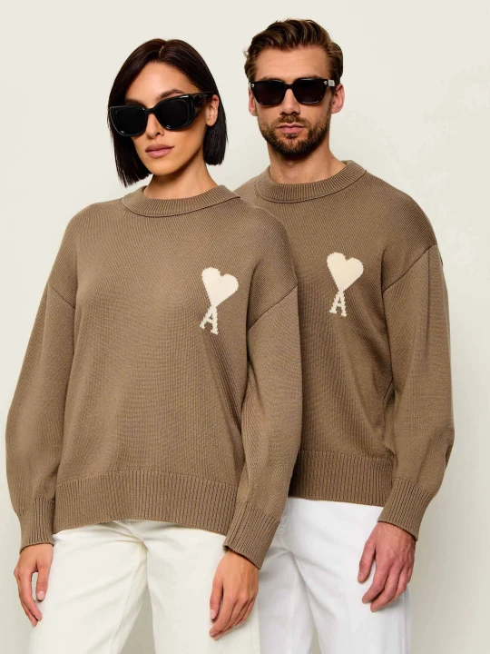 Zdjęcie produktu AMI Paris Wełniany sweter DE COEUR | Regular Fit beżowy