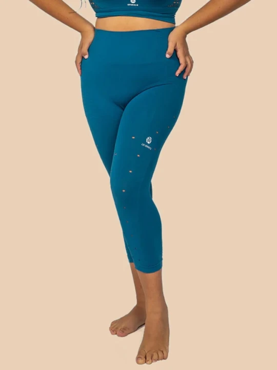 Zdjęcie produktu Anaissa Legginsy sportowe "Namasté" w kolorze niebieskim rozmiar: M/L