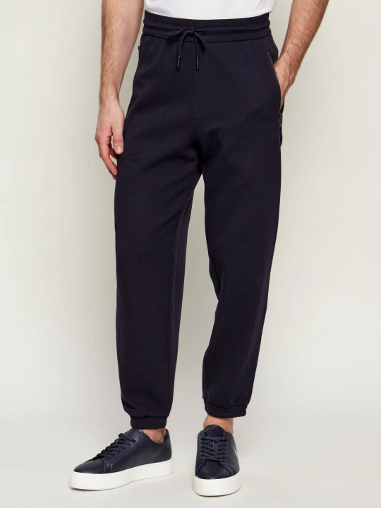 Zdjęcie produktu Armani Exchange Spodnie dresowe | Regular Fit granatowy