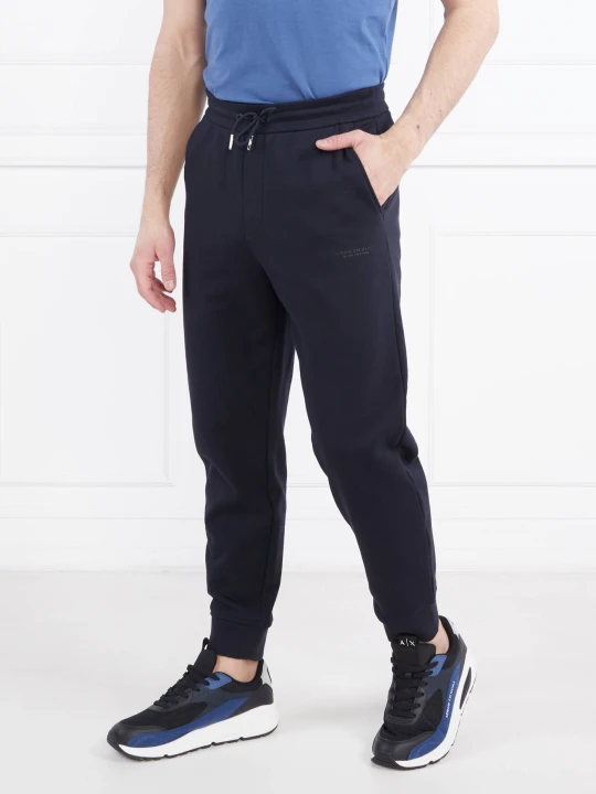 Zdjęcie produktu Armani Exchange Spodnie dresowe | Regular Fit granatowy