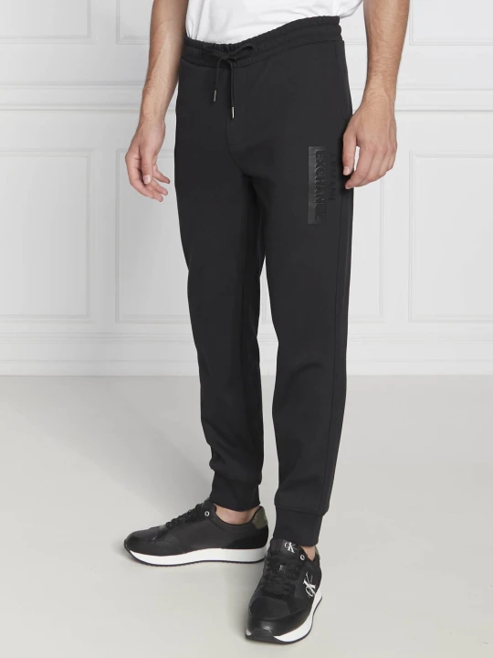 Zdjęcie produktu Armani Exchange Spodnie dresowe | Regular Fit czarny