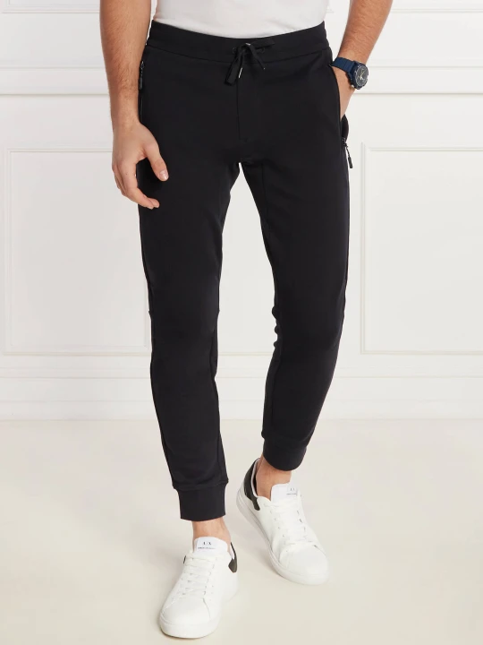 Zdjęcie produktu Armani Exchange Spodnie dresowe | Regular Fit granatowy