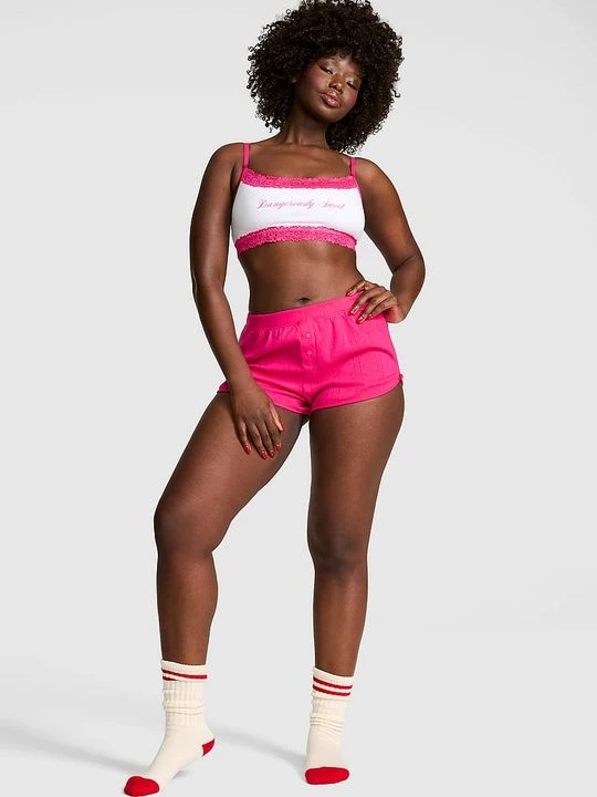 Zdjęcie produktu Ażurowe szorty typu boxer z kokardką Victoria's Secret Różowy