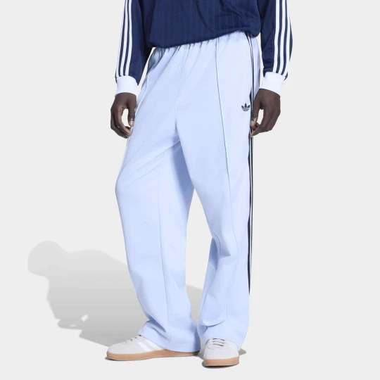 Zdjęcie produktu Baggy spodnie treningowe adidas Originals niebieski