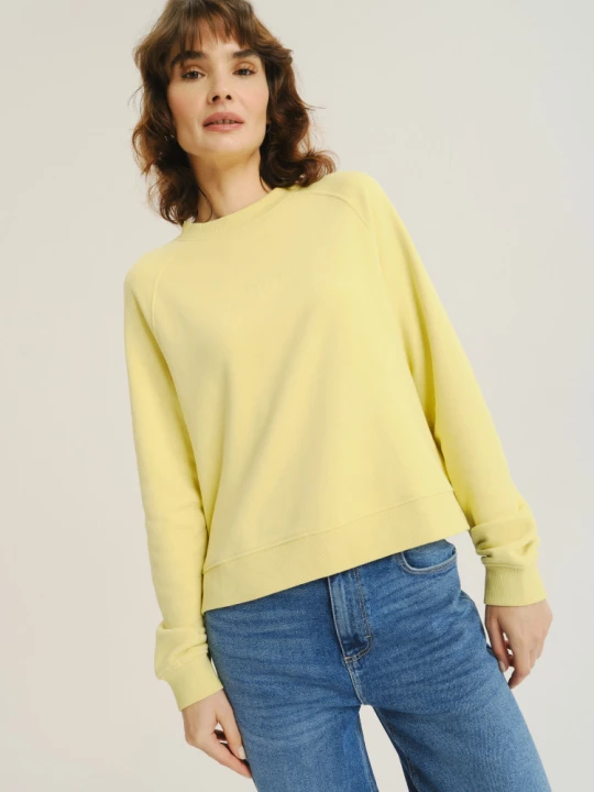 Zdjęcie produktu Basicowa bluza w masełkowym kolorze Greenpoint