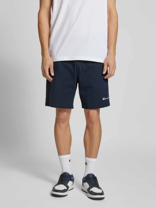 Zdjęcie produktu Bermudy o kroju relaxed fit z kieszeniami zapinanymi na zamek błyskawiczny Champion Ciemnoniebieski