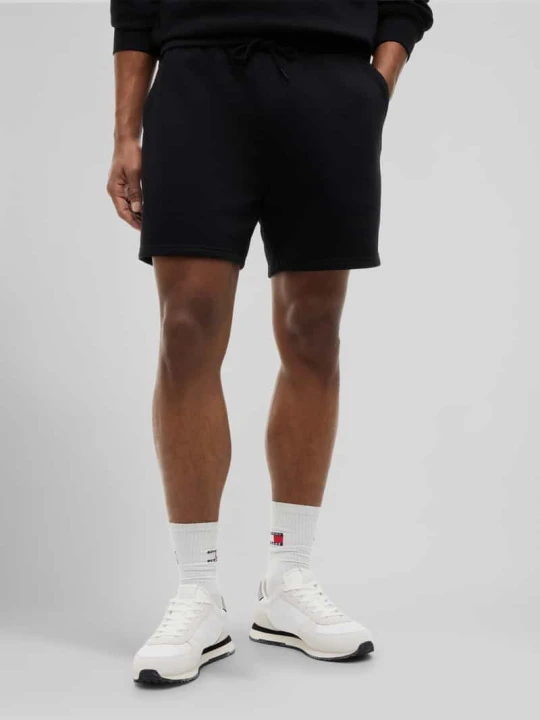 Zdjęcie produktu Bermudy o kroju relaxed fit z mieszanki bawełny z tunelem Tommy Jeans Czarny