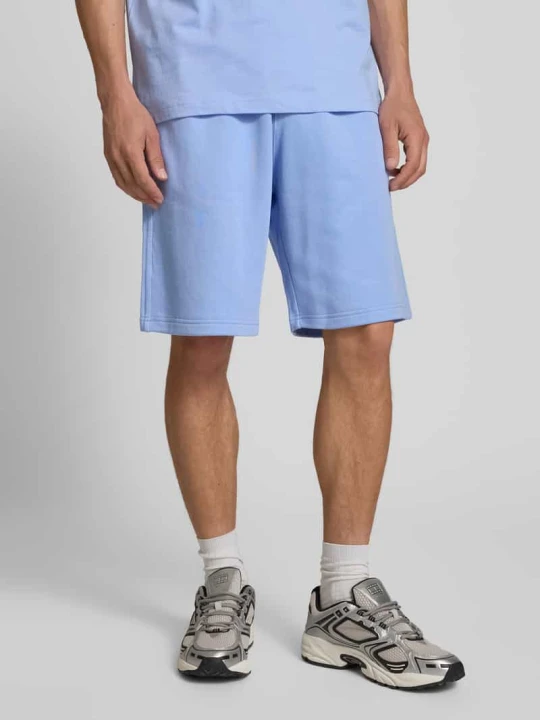 Zdjęcie produktu Bermudy z dzianiny dresowej o kroju relaxed fit z wyhaftowanym logo model ‘ICONS’ Champion Jasnoniebieski