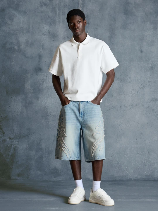 Zdjęcie produktu Bershka Bermudy O Kroju Baggy Z Naszywką Mężczyzna Jasnoniebieski